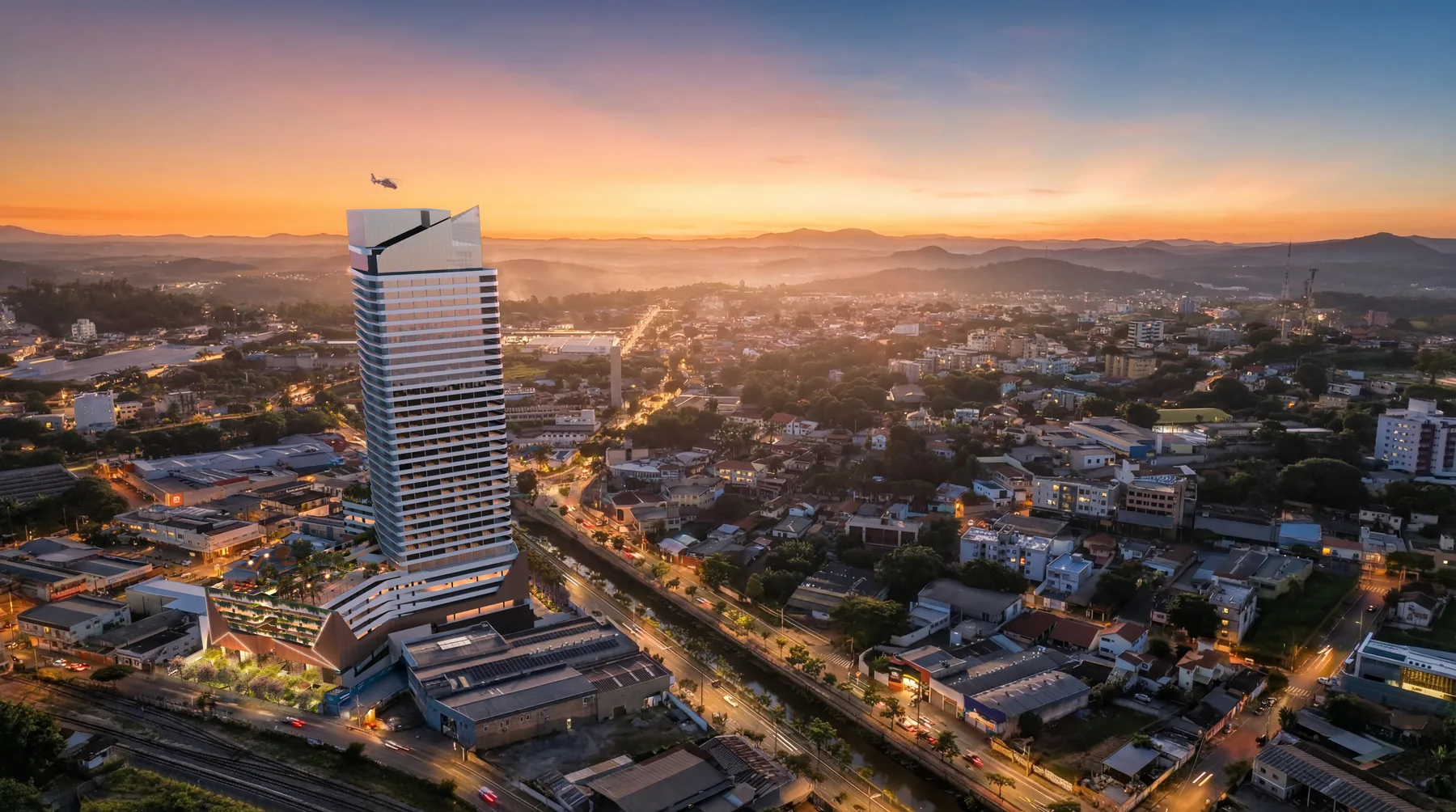 Vista aérea do complexo Nexus integrado ao Centro de Betim ao pôr do sol